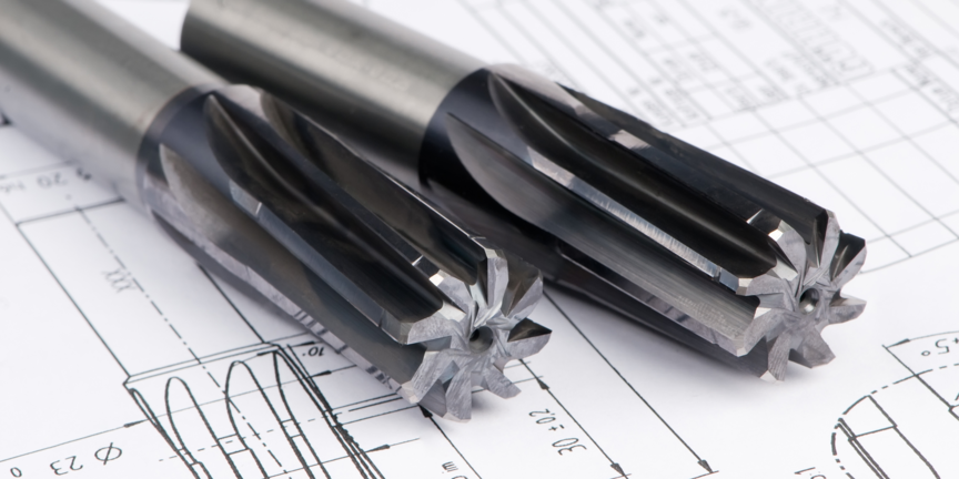 Imagen de unos escariadores sobre un plano